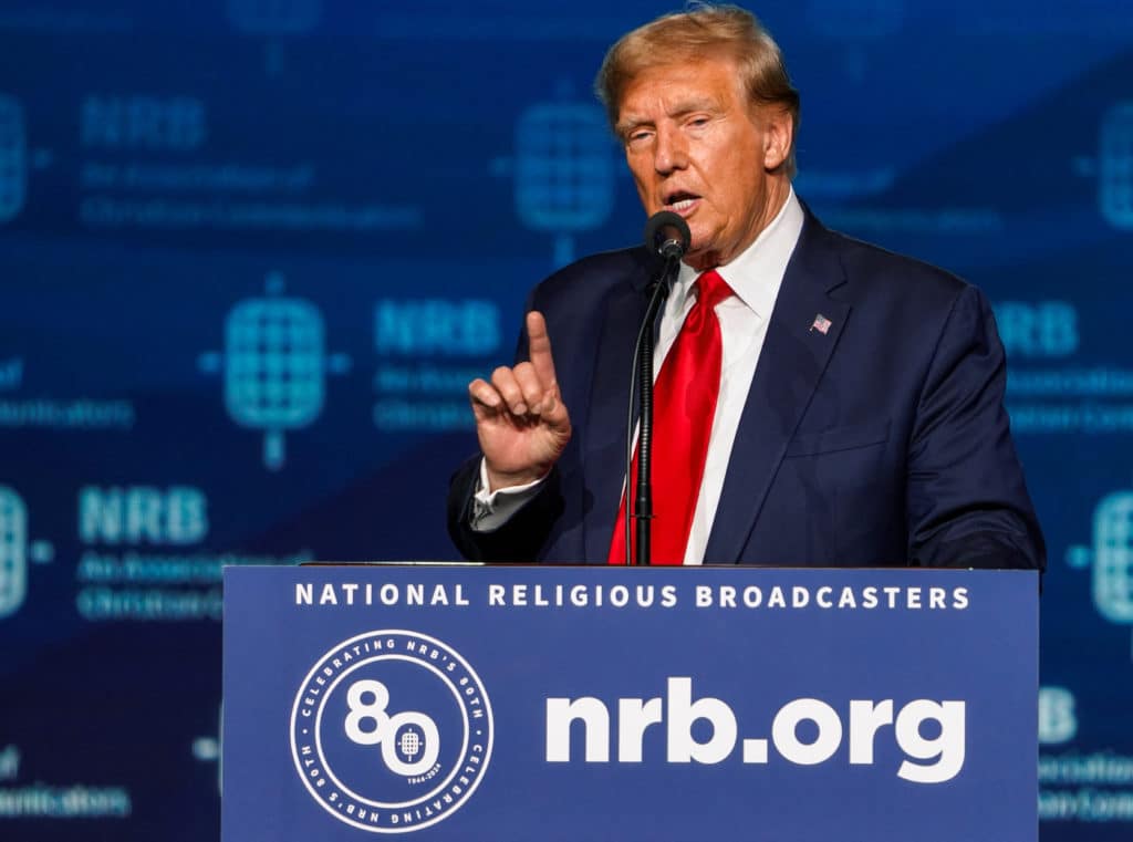Former U.S. President and Republican presidential candidate Donald Trump addresses the 2024 National Religious Broadcasters Association International Christian Media Convention, as part of the NRB Presidential Forum in Nashville, Tennessee, U.S., February 22, 2024.  REUTERS/Seth Herald